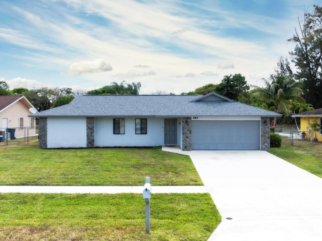 185 Bilbao Street, Royal Palm Beach, FL 33411
