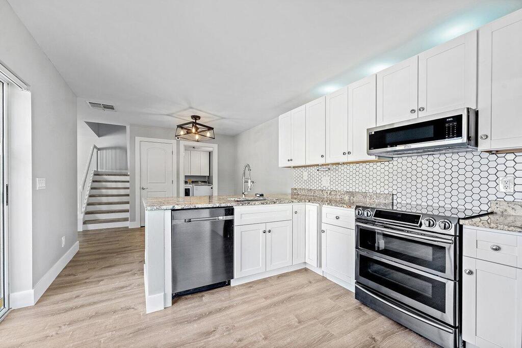 8132 Sedgewick Court, Lake Clarke Shores, FL 33406